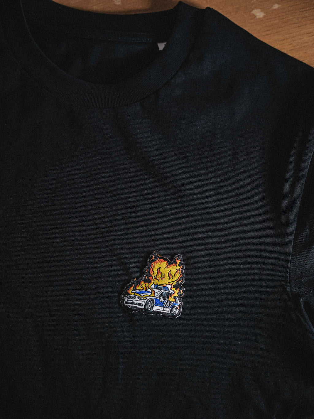 unisex shirt "burning cop car patched"