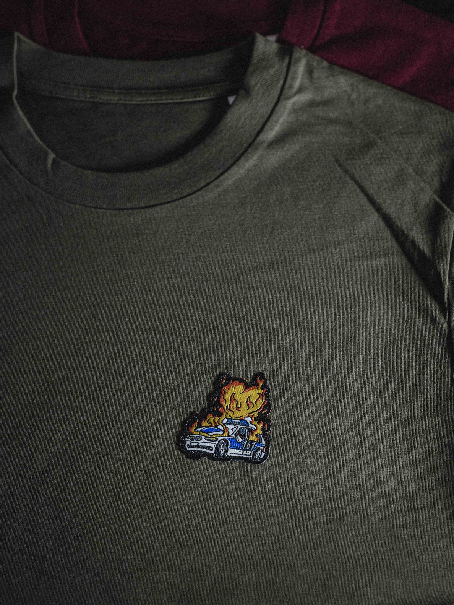 unisex shirt "burning cop car patched"