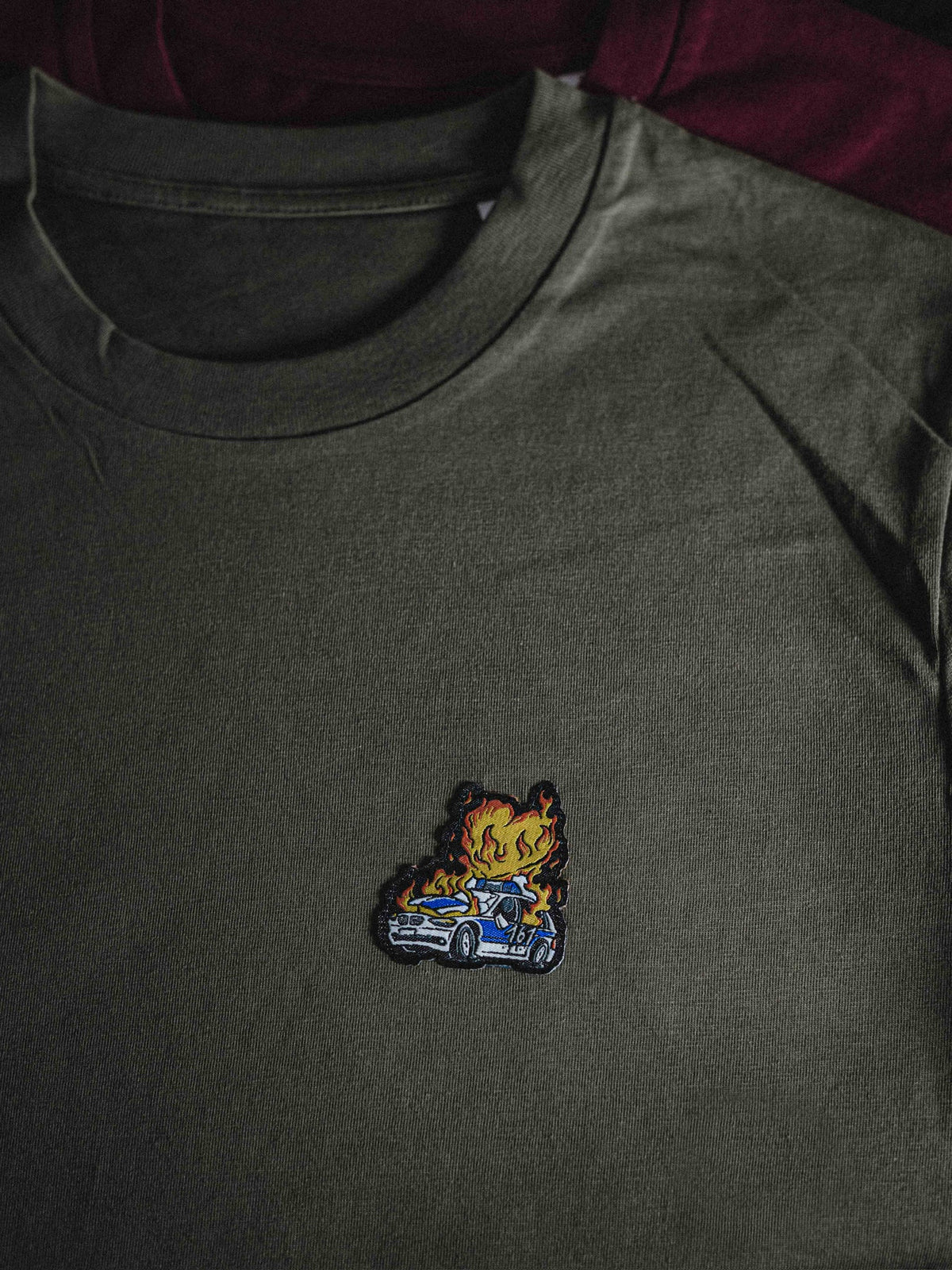 unisex shirt "burning cop car patched"