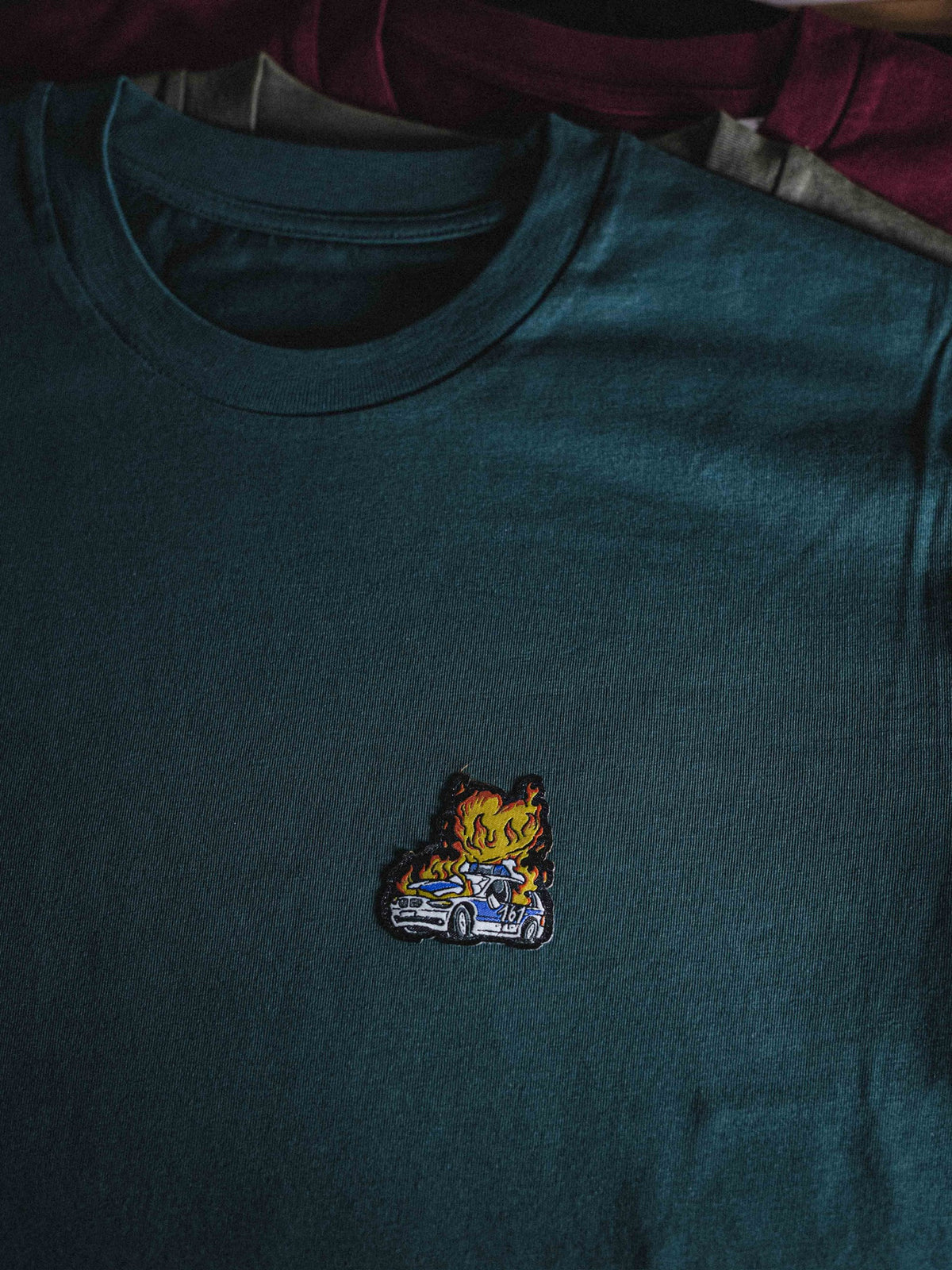 unisex shirt "burning cop car patched"